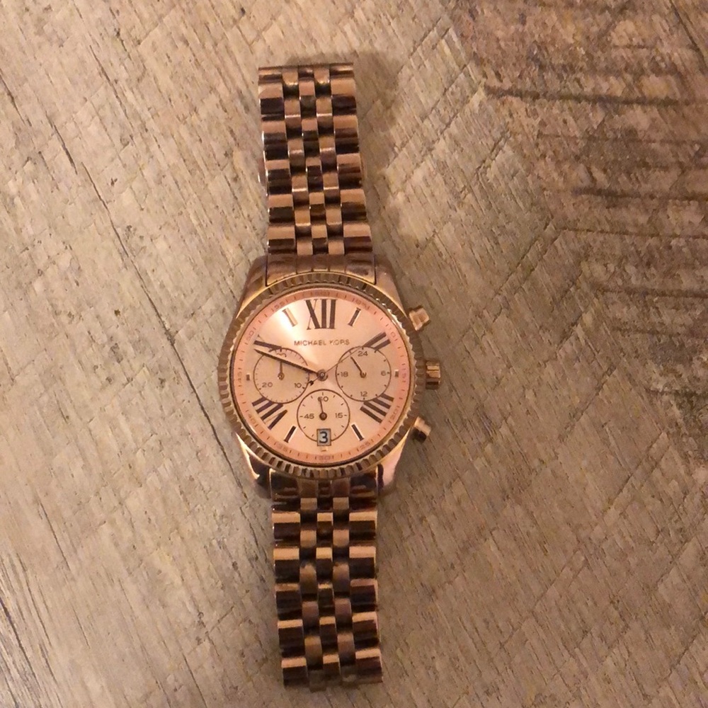 Rose gold michael KOR’s watch